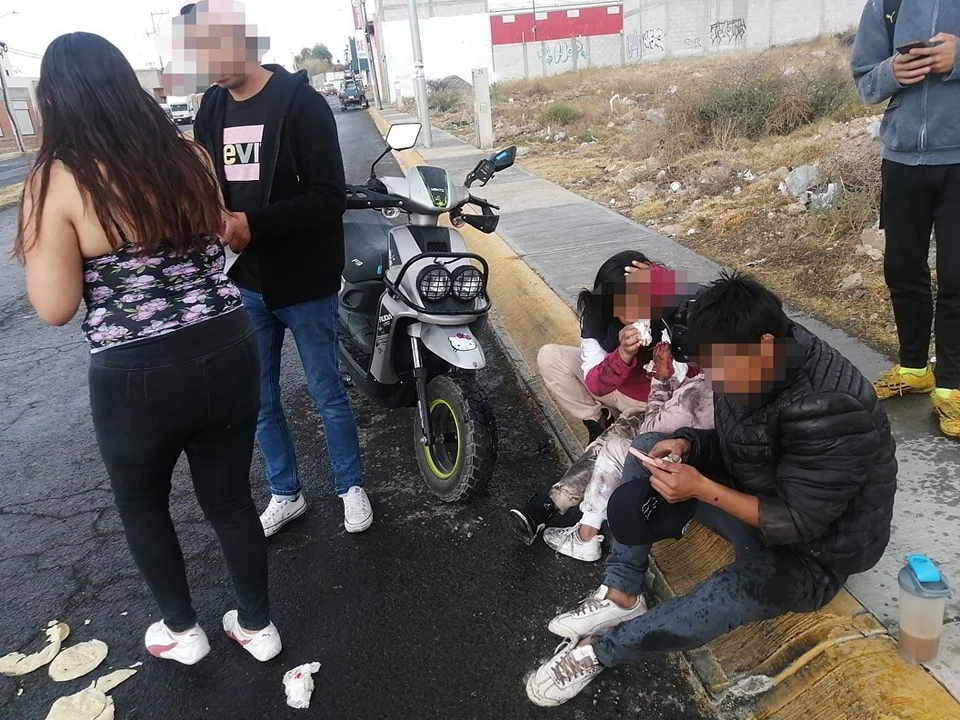 accidentados de derrape de moto en la Providencia
